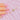 Antique floral stock pin shown against pink knitwear