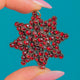 Victorian Rose Cut Garnet Cluster Star Pendant, front of Garnet-set star on blue background