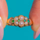 Antique Victorian 18ct Gold Double Row Pearl Emerald Ring — front on blue