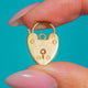 Miniature Gold heart padlock with keyhole and screwhead details