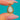 Pear-shaped Opal pendant with colourful flashes and a looped Gold border