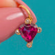 18ct Gold Heart-Shape Garnet Charm Rose Cut Diamond Accents, front detail of the heart-shaped Garnet and four Diamond accents