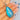 Morpho butterfly wing pendant showing blue panel and flower-like bail